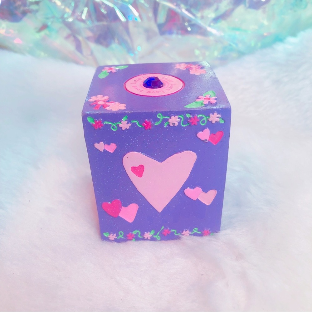 vintage 2000s coin bank from claire’s (purple)
